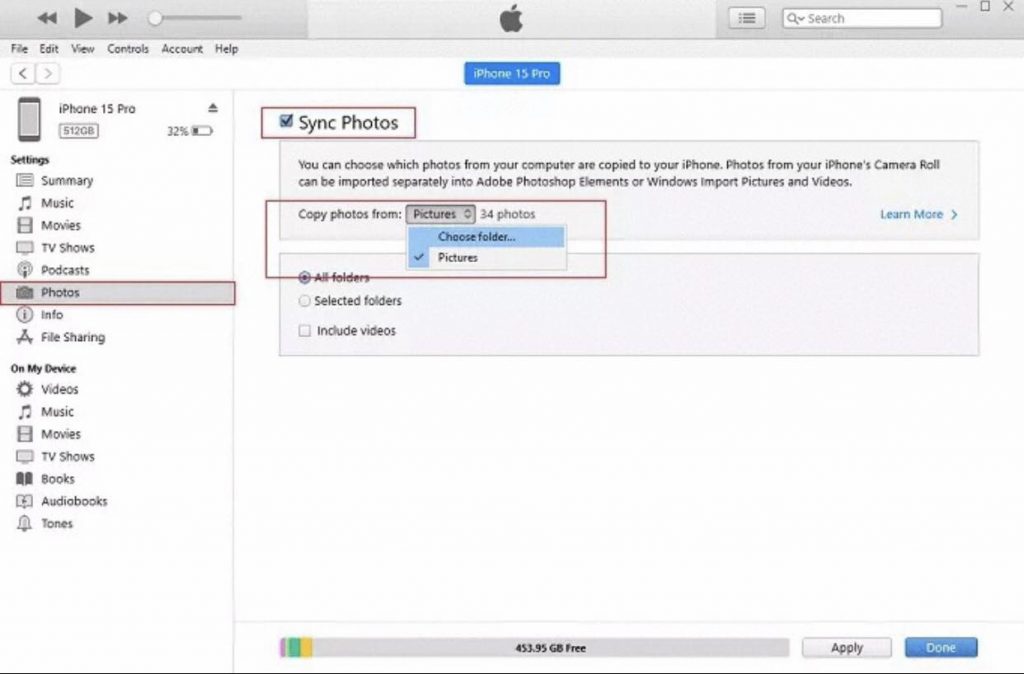 To transfer photos and videos, click "Photos," select "Sync Photos," and choose the folder containing the files you exported from your Android device.